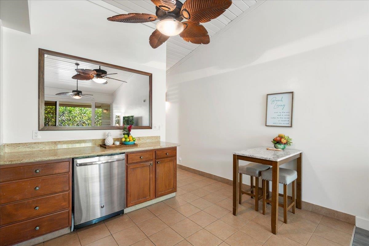 5315 Lower Honoapiilani Road, Unit D232 Lahaina, HI 96761 - Photo 11 of 31 a kitchen with a sink cabinets and window
