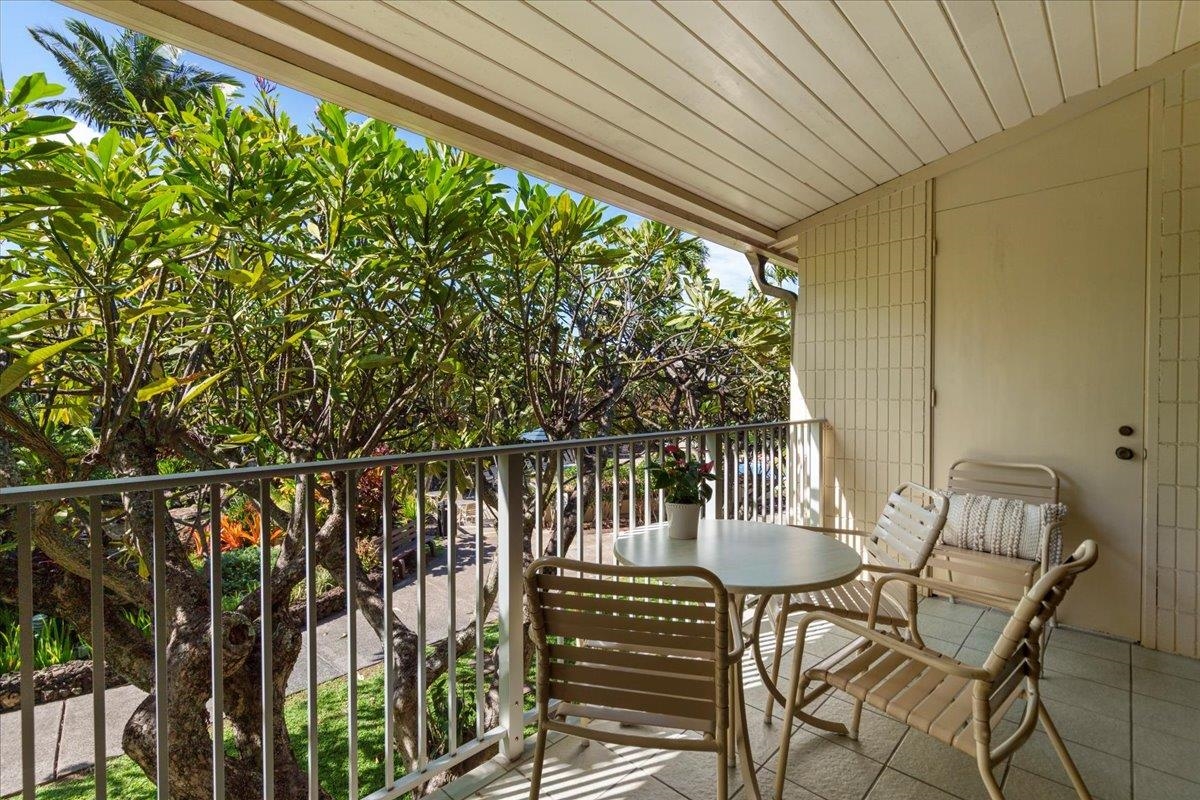 5315 Lower Honoapiilani Road, Unit D232 Lahaina, HI 96761 - Photo 13 of 31 a view of a chairs and table in the balcony