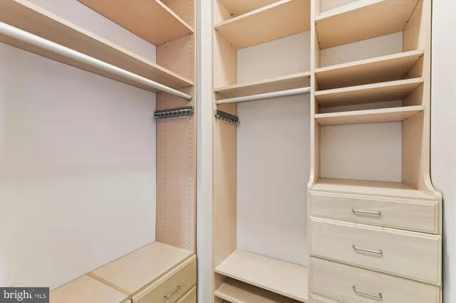 a view of an empty walk in closet