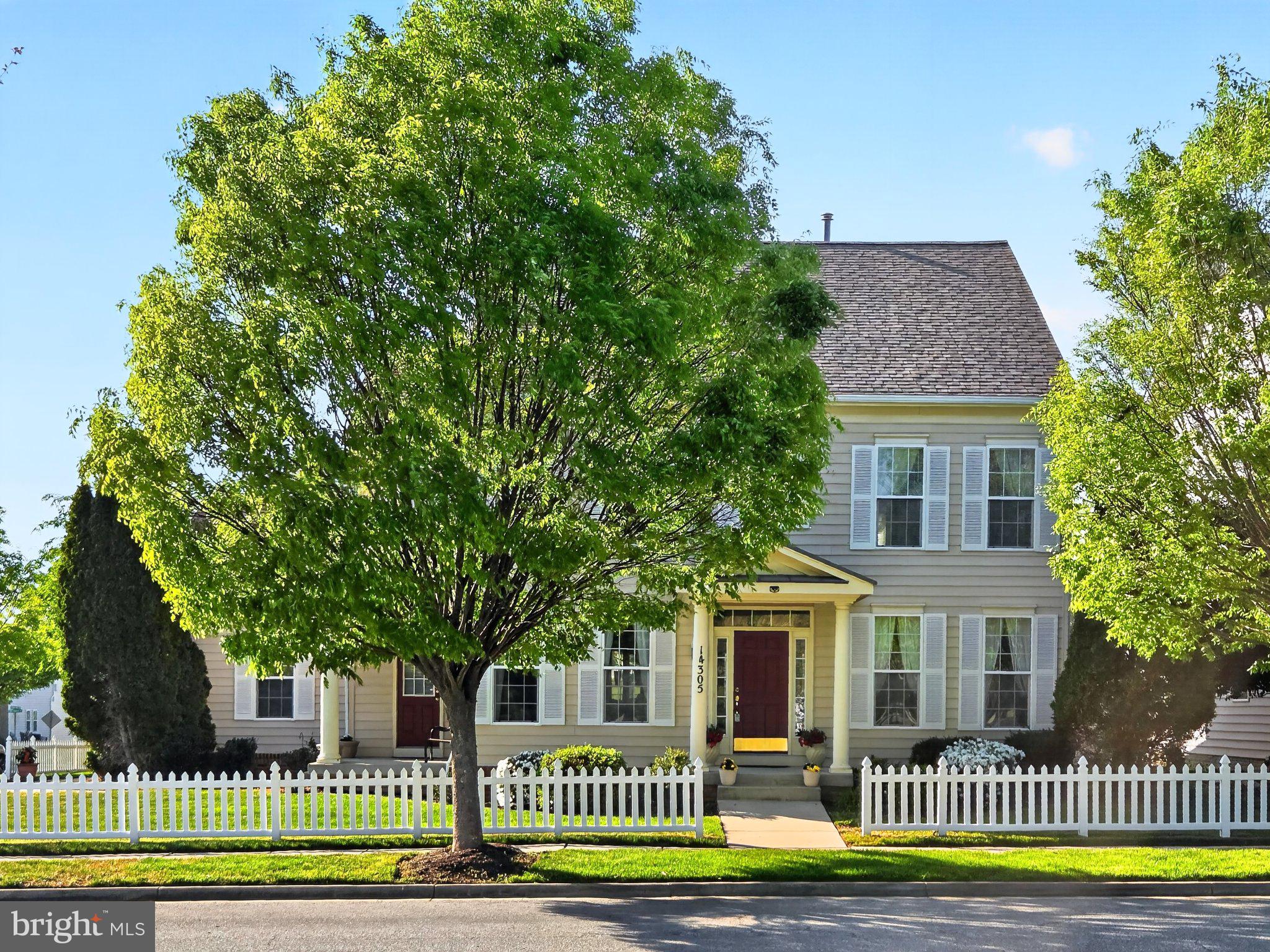 Charming home with lush greenery.