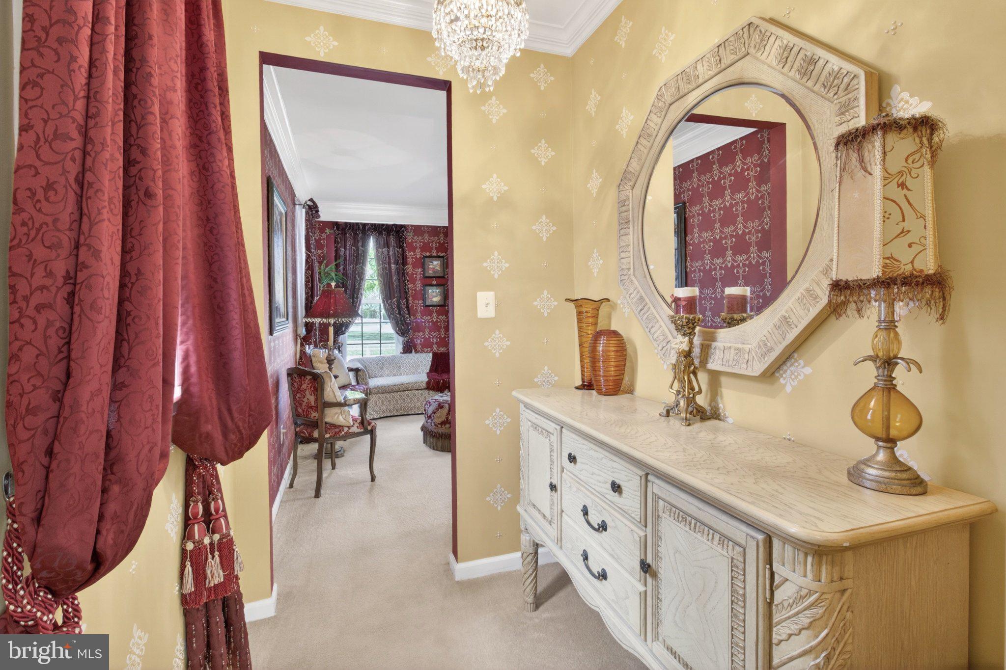 14305 Lightfoot Street Accokeek, MD 20607 - Photo 14 of 66 Elegant entryway with rich hues.