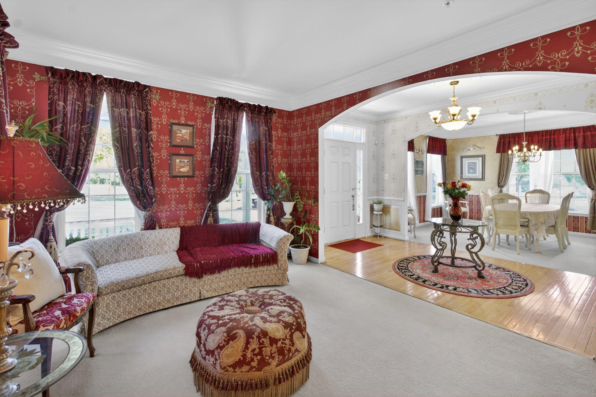 14305 Lightfoot Street Accokeek, MD 20607 - Photo 15 of 66 a living room with furniture and a chandelier