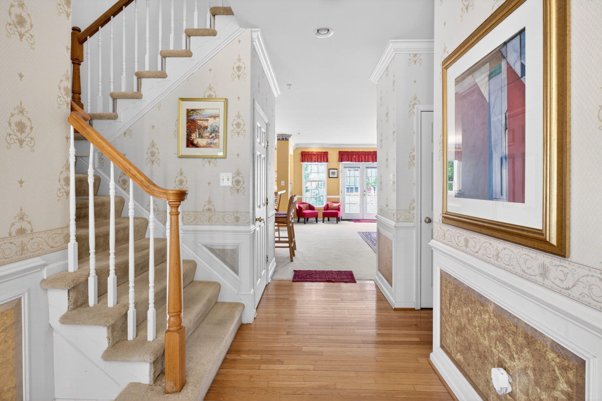 14305 Lightfoot Street Accokeek, MD 20607 - Photo 20 of 66 a view of an entryway with wooden floor and windows