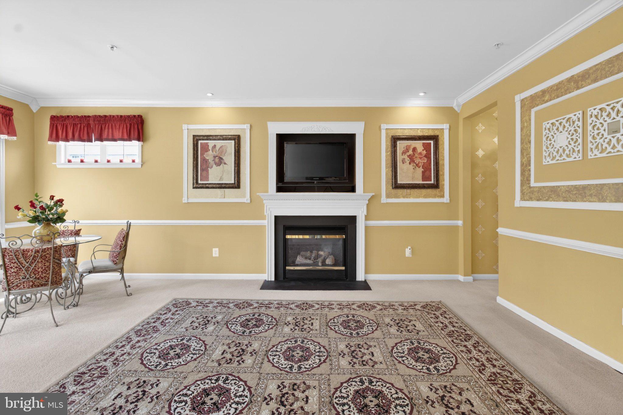 14305 Lightfoot Street Accokeek, MD 20607 - Photo 21 of 66 a living room with furniture and a flat screen tv