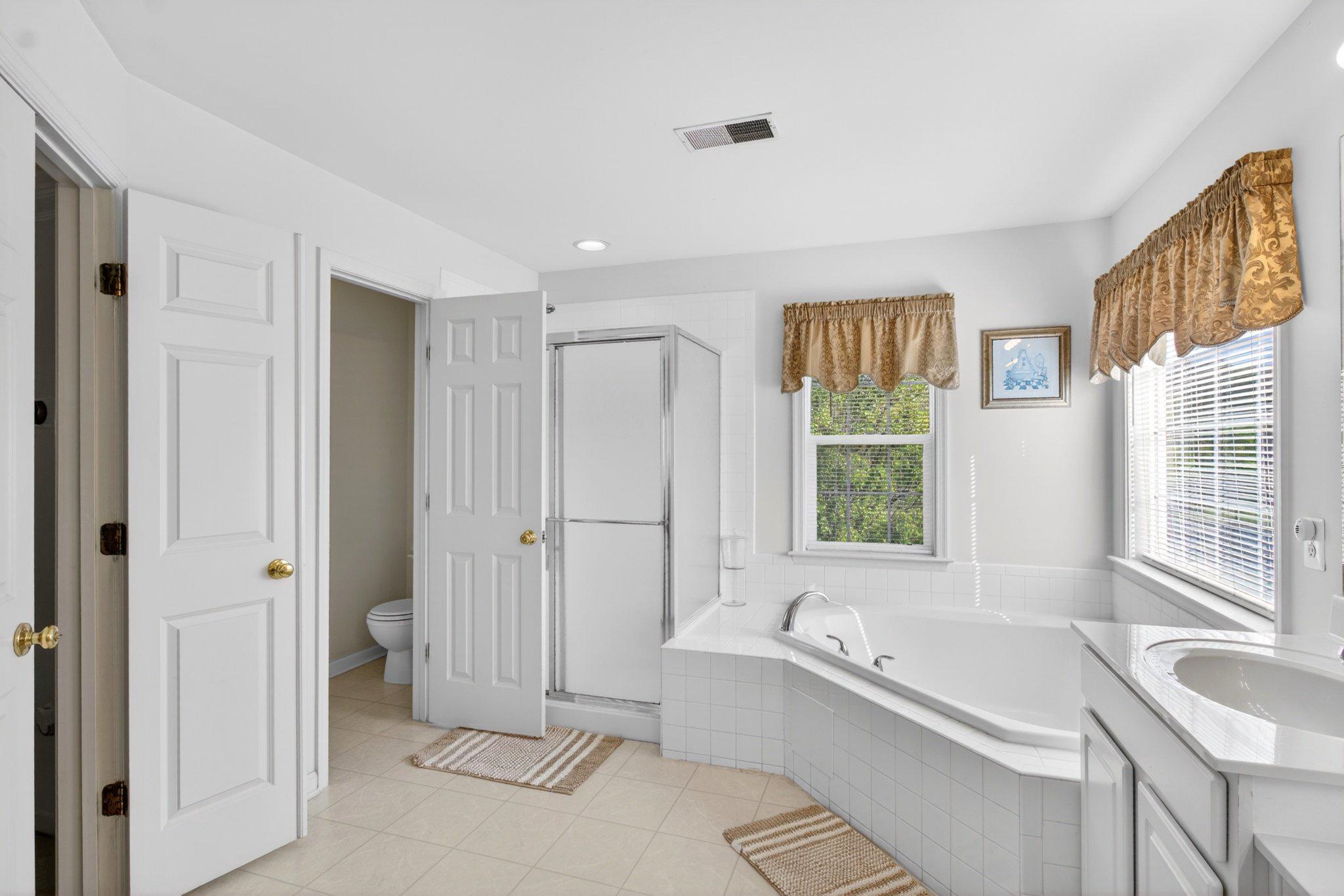 14305 Lightfoot Street Accokeek, MD 20607 - Photo 38 of 66 Bright and airy primary ensuite retreat.