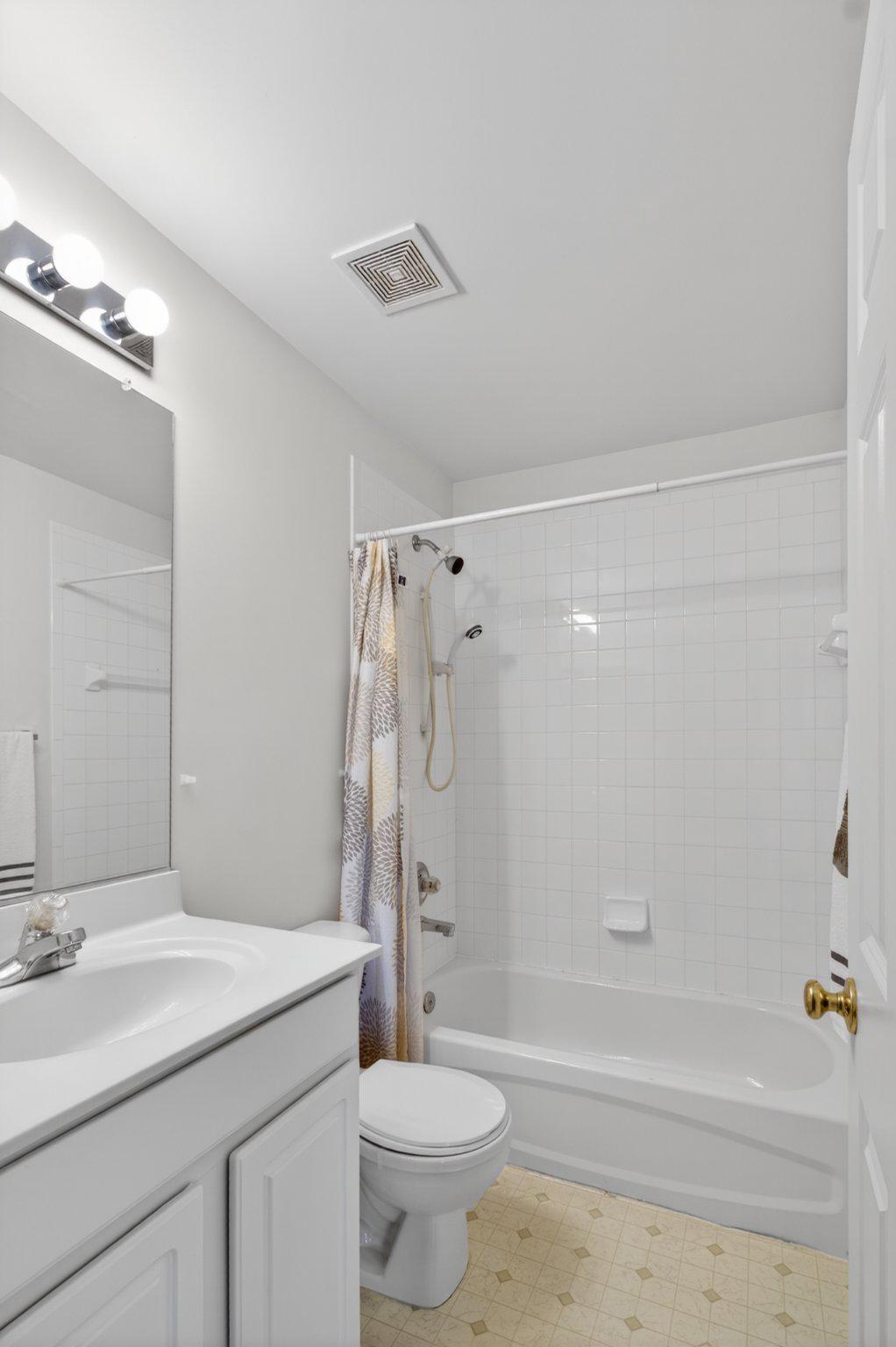 14305 Lightfoot Street Accokeek, MD 20607 - Photo 44 of 66 a bathroom with a sink a toilet and a bathtub
