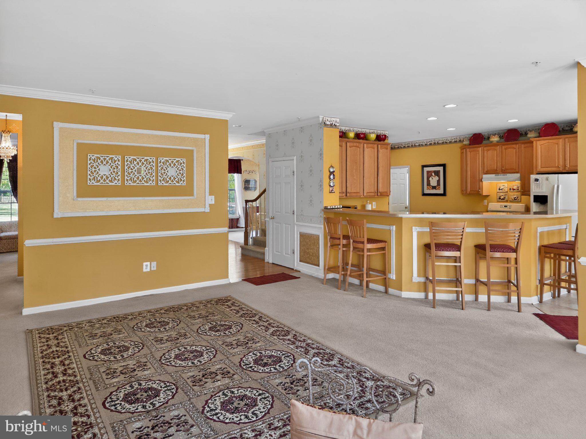 14305 Lightfoot Street Accokeek, MD 20607 - Photo 5 of 11 Inviting open space with warm hues.