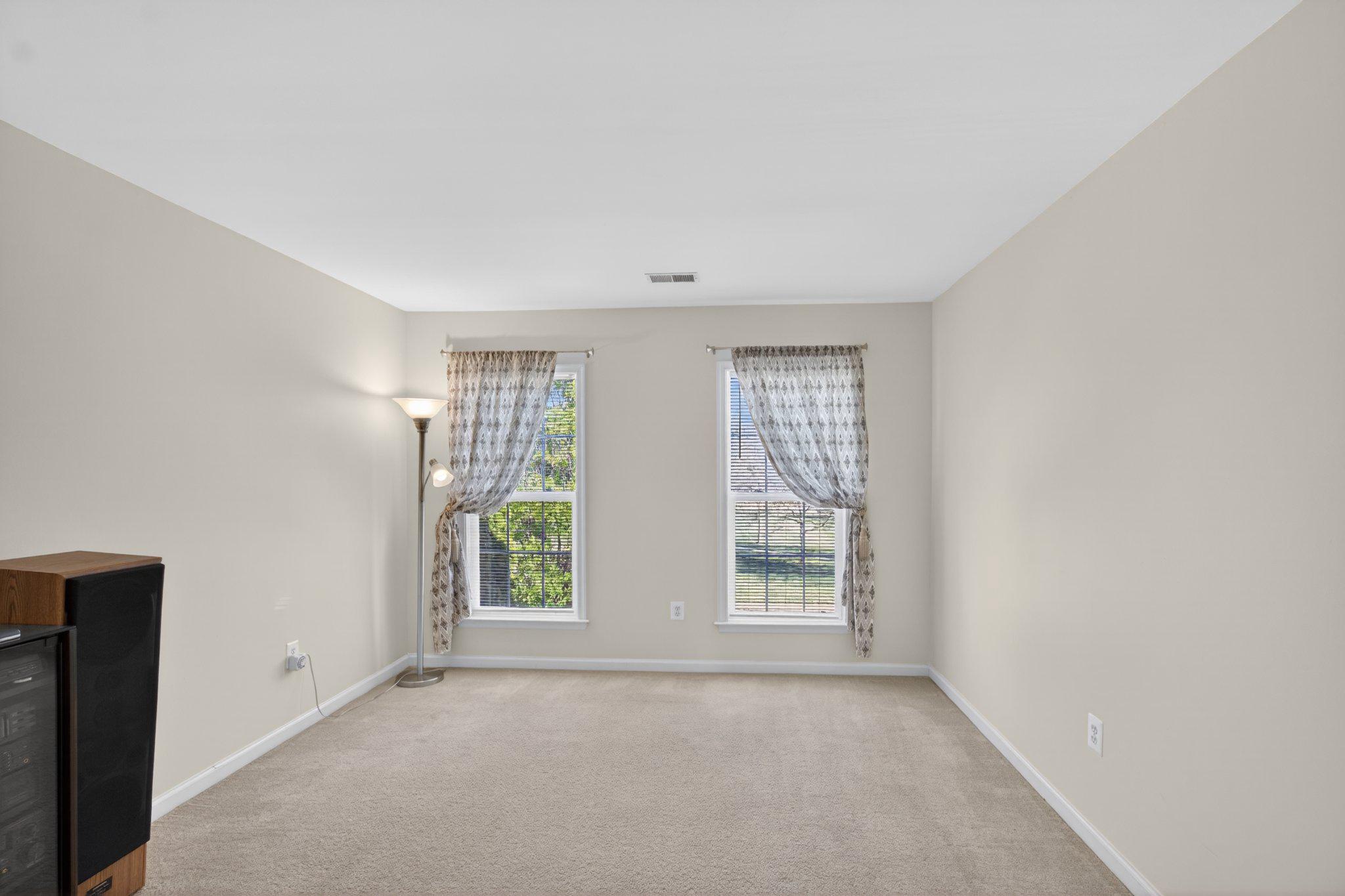 14305 Lightfoot Street Accokeek, MD 20607 - Photo 52 of 66 an empty room with windows