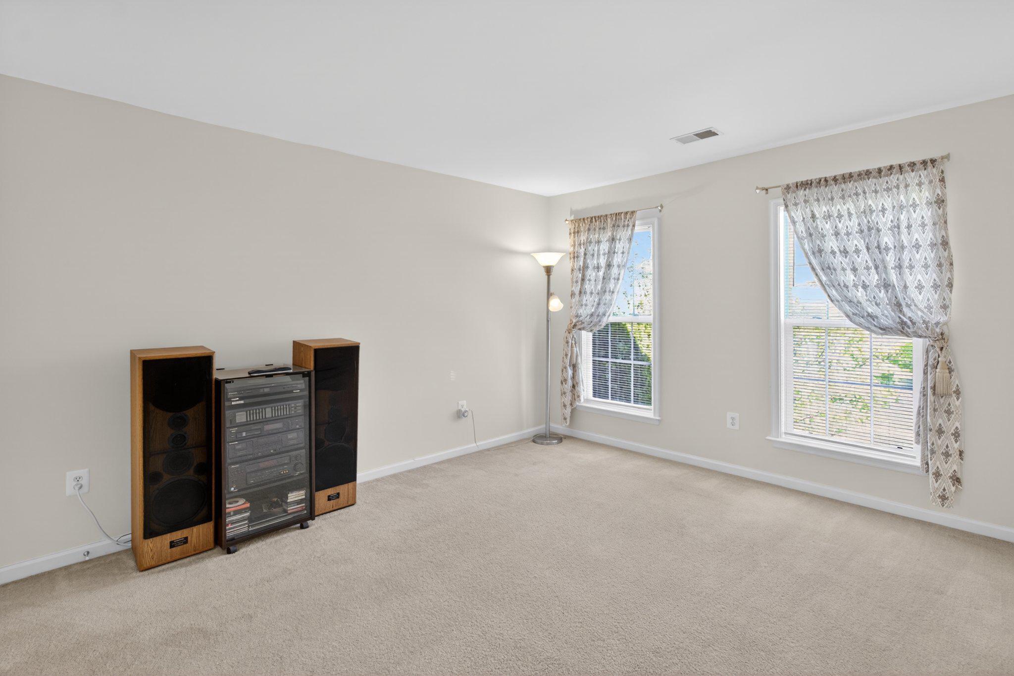 14305 Lightfoot Street Accokeek, MD 20607 - Photo 53 of 66 a view of an empty room with furniture and a window