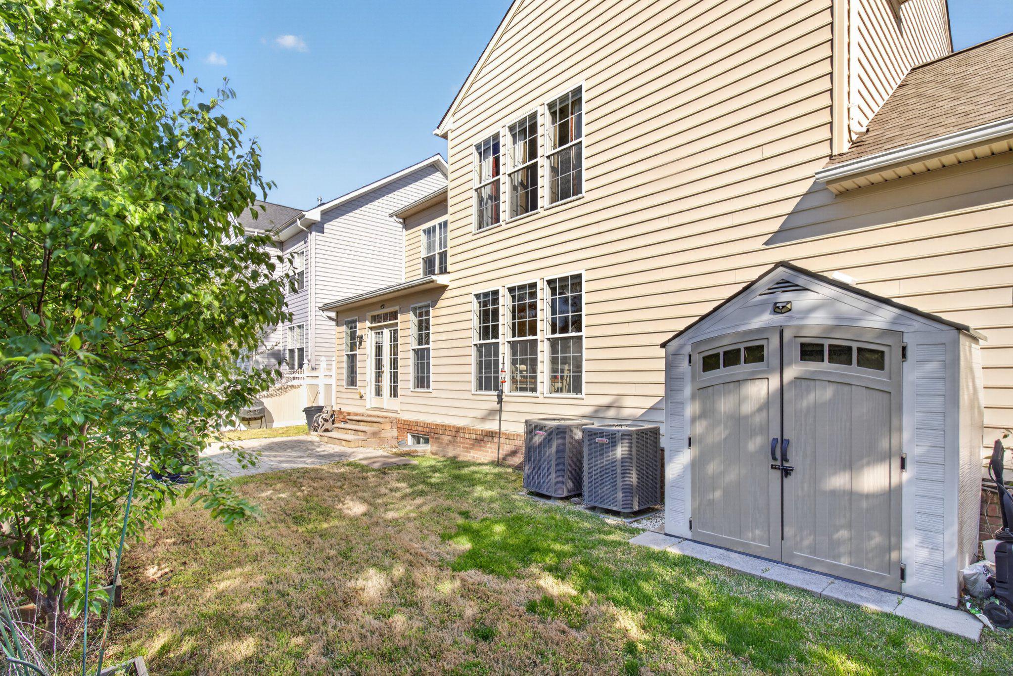 14305 Lightfoot Street Accokeek, MD 20607 - Photo 55 of 66 a view of a house with a yard