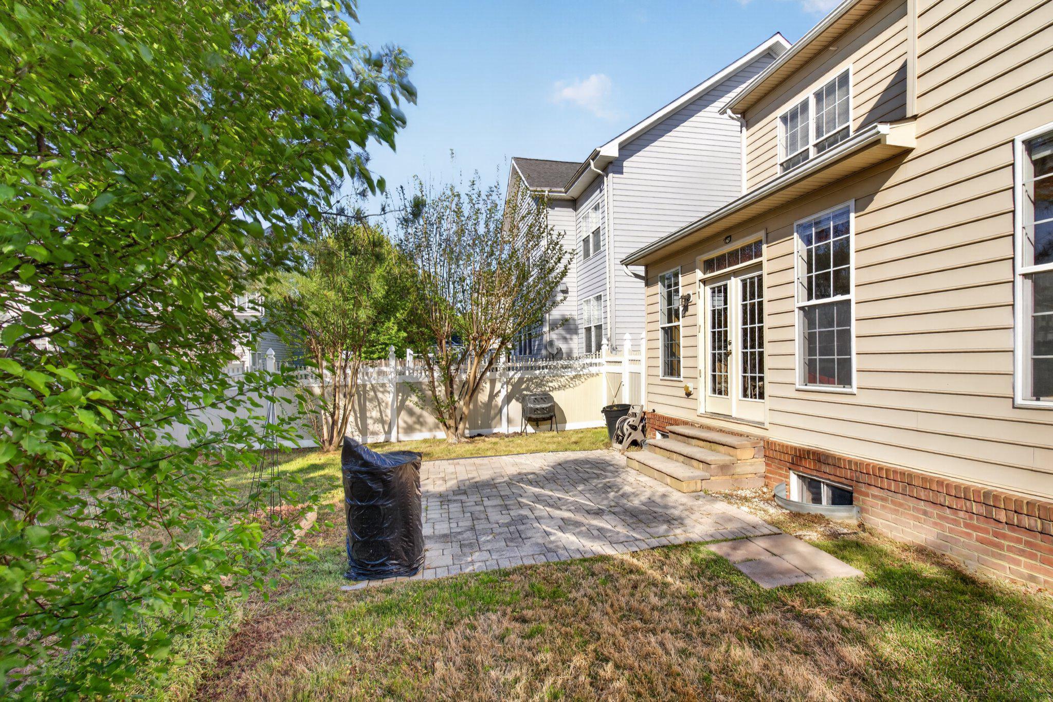 14305 Lightfoot Street Accokeek, MD 20607 - Photo 57 of 66 a view of a house with backyard and sitting area