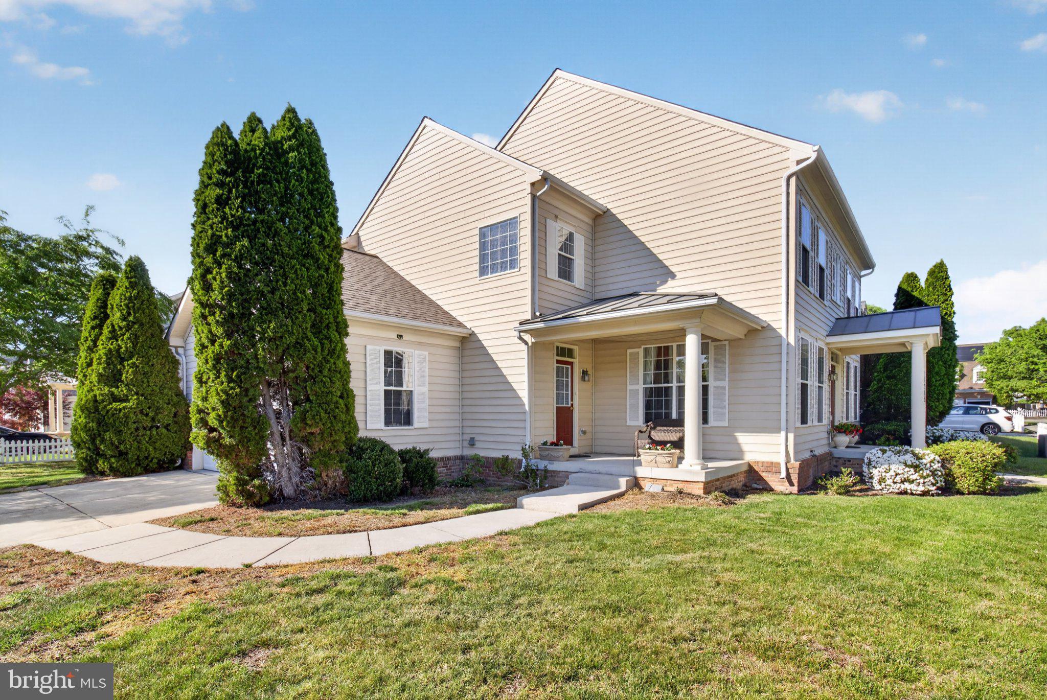 14305 Lightfoot Street Accokeek, MD 20607 - Photo 6 of 66 a view of a house with a yard and plants