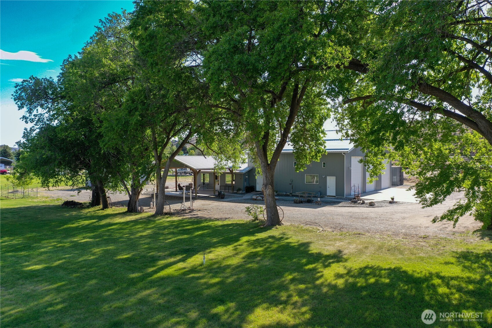 46 Shumway Road Omak, WA 98841 - Photo 33 of 40 a house with a tree in front of it