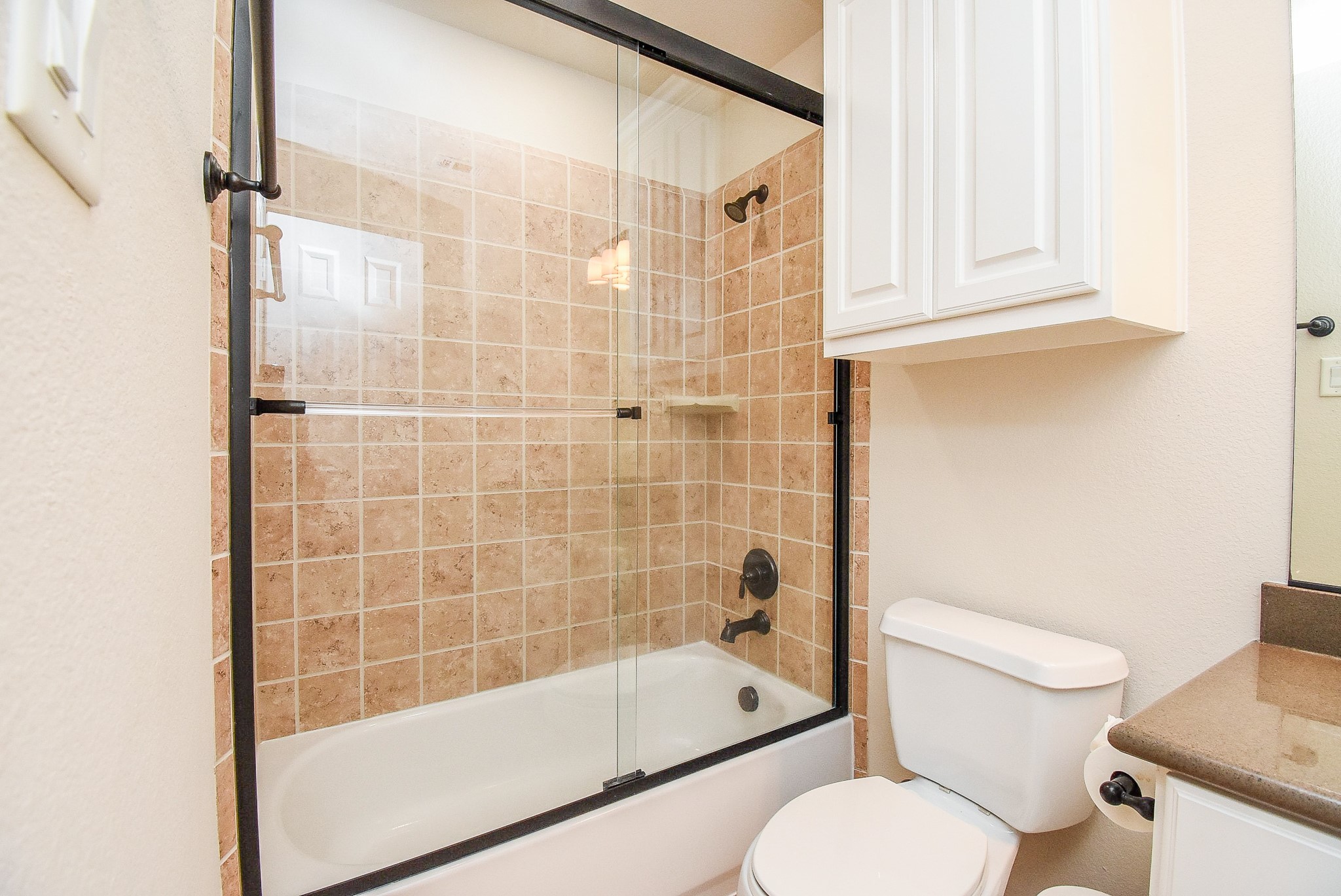 27427 Guthrie Ridge Lane Katy, TX 77494 - Photo 37 of 48 a bathroom with a toilet and shower