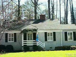 1504 Banbury Road Raleigh, NC 27607 - Photo 1 of 1 a front view of house with yard