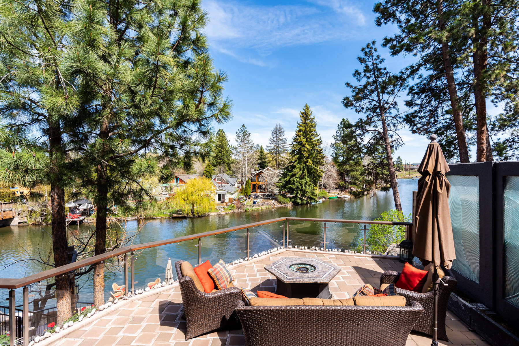 128 Northwest Allen Road Bend, OR 97703 - Photo 15 of 40 Patio on the river with an amazing view!