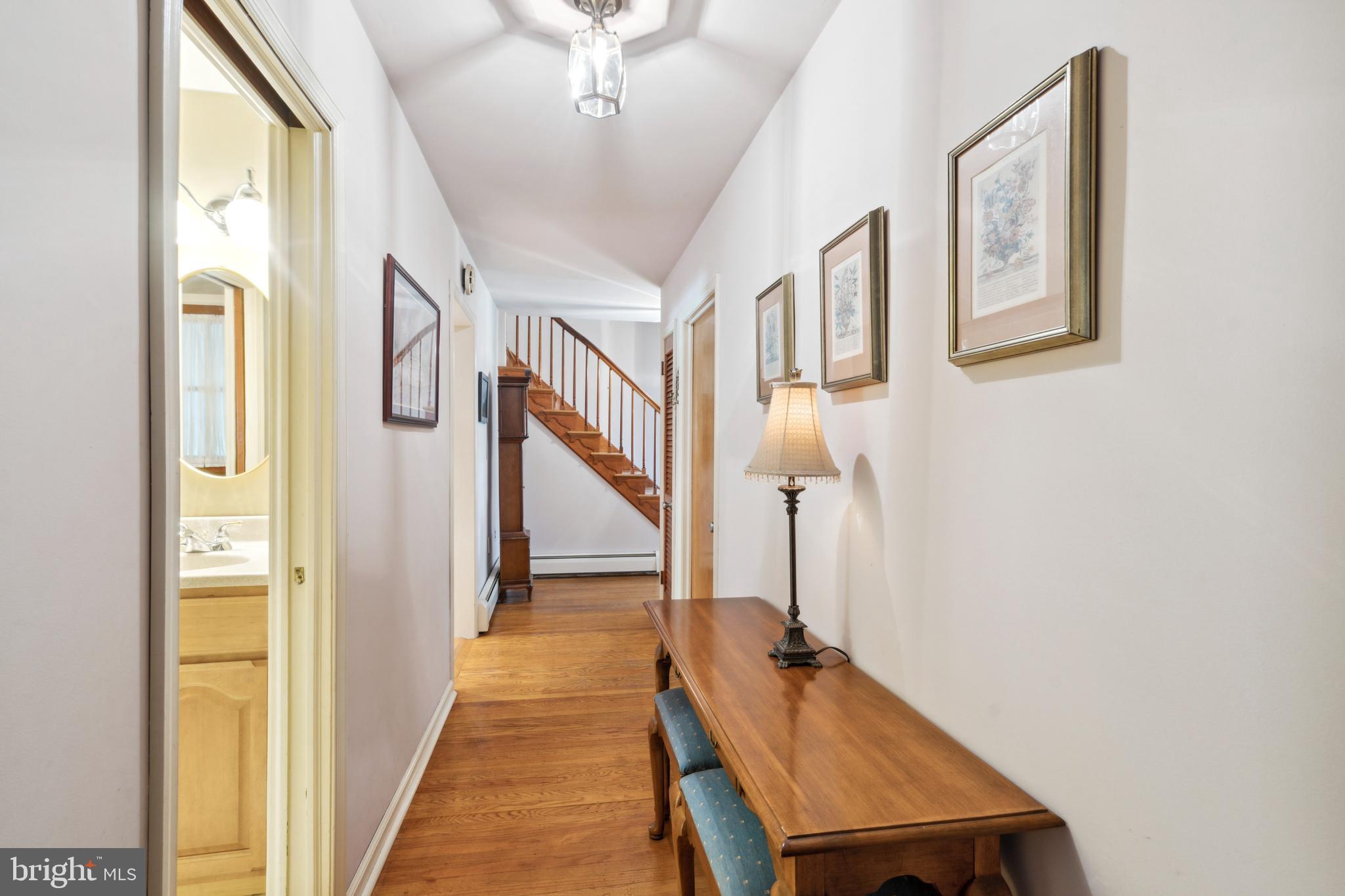 627 Georgetown Road Glen Mills, PA 19342 - Photo 9 of 25 Hallway to Den & Family Room