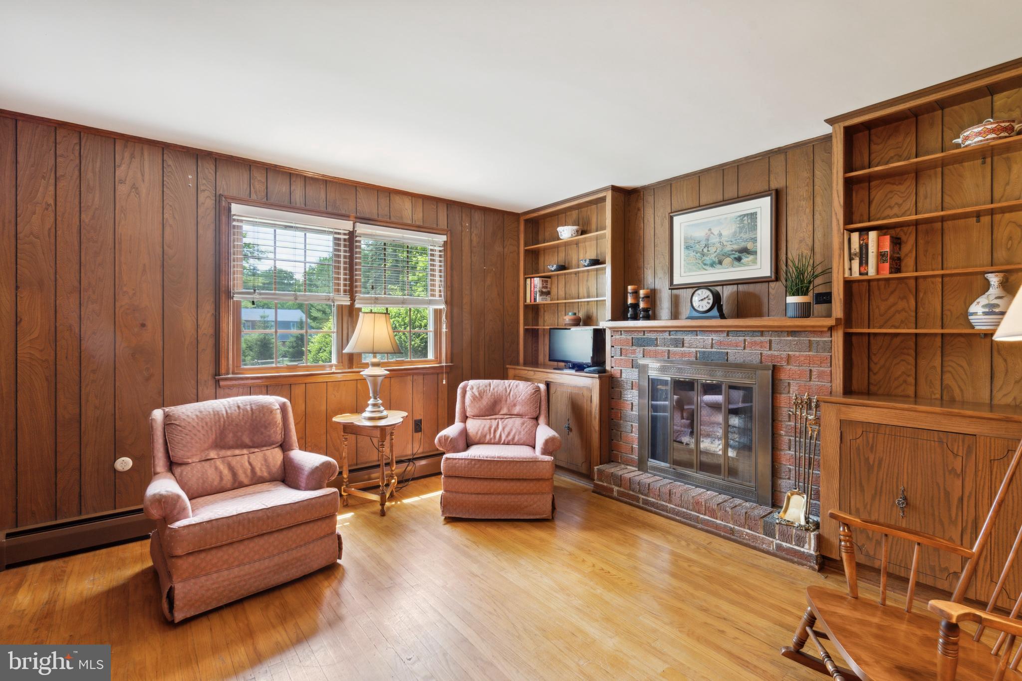 627 Georgetown Road Glen Mills, PA 19342 - Photo 10 of 25 Den with Wood Burning Fireplace