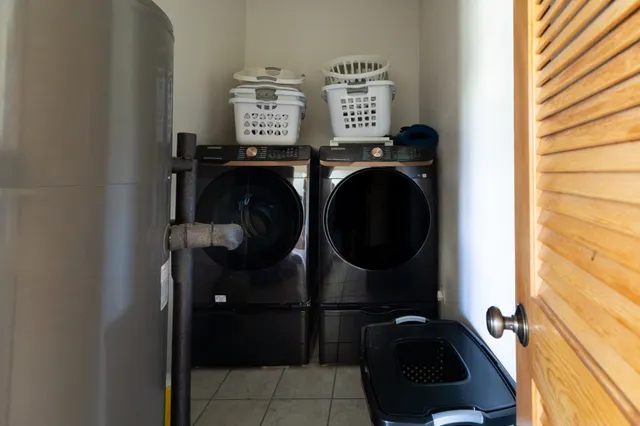 a utility room with dryer and washer