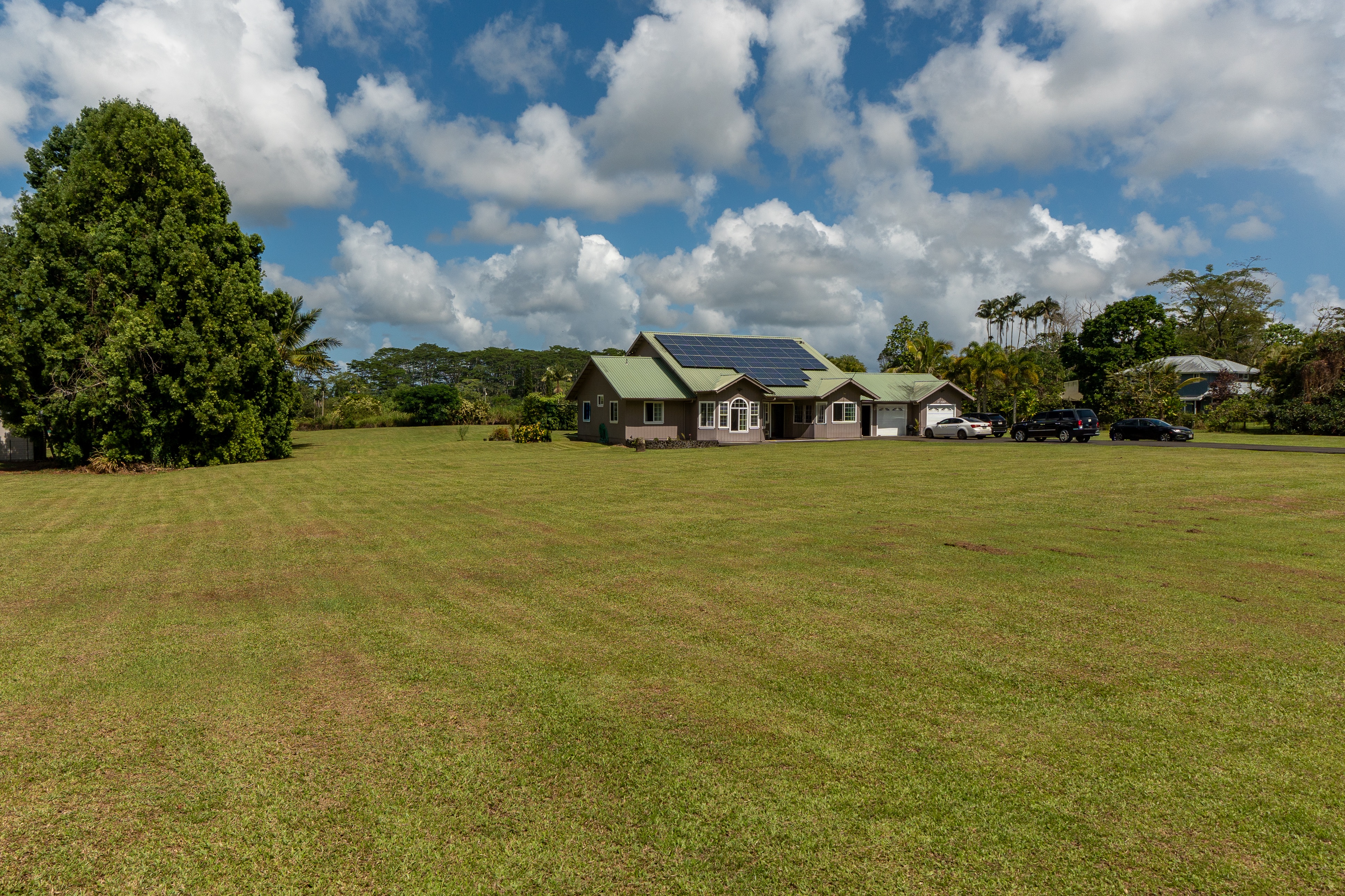17-4044 South Road Keaau, HI 96749 - Photo 25 of 28 a view of a lake with houses in the back