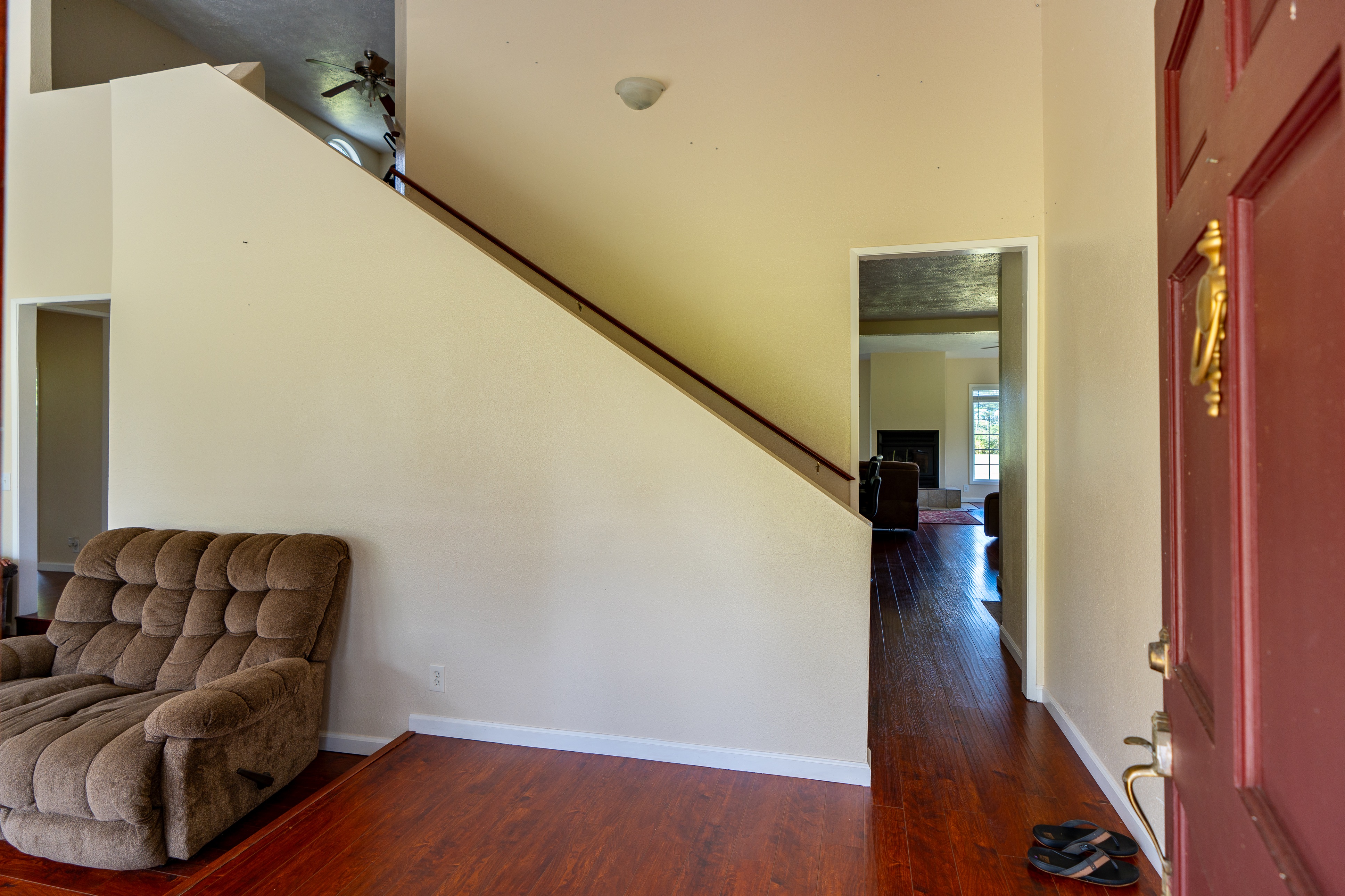 17-4044 South Road Keaau, HI 96749 - Photo 4 of 28 a living room with furniture and a stair