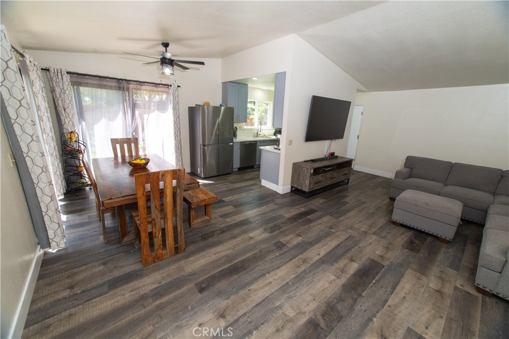 1 San Ramon Drive Chico, CA 95973 - Photo 13 of 42 a living room with furniture wooden floor and a flat screen tv