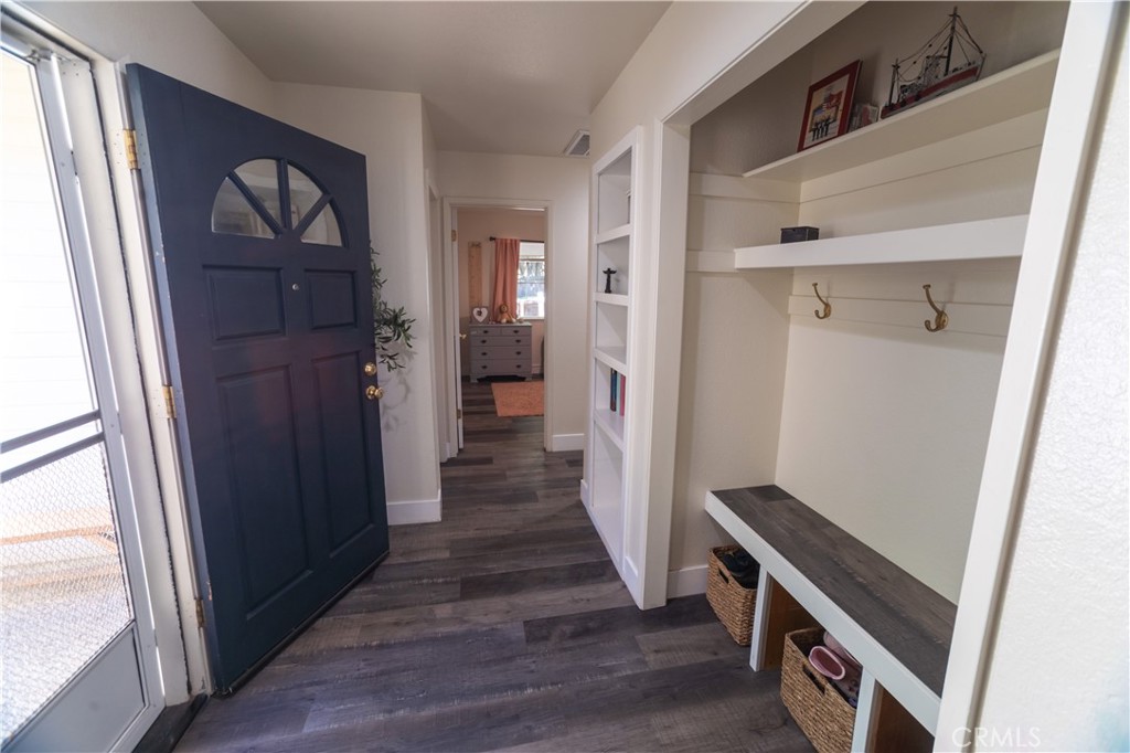 1 San Ramon Drive Chico, CA 95973 - Photo 15 of 42 a view of a hallway with wooden floor and staircase