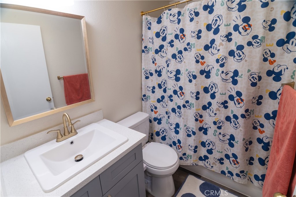 1 San Ramon Drive Chico, CA 95973 - Photo 21 of 42 a bathroom with a sink and a mirror