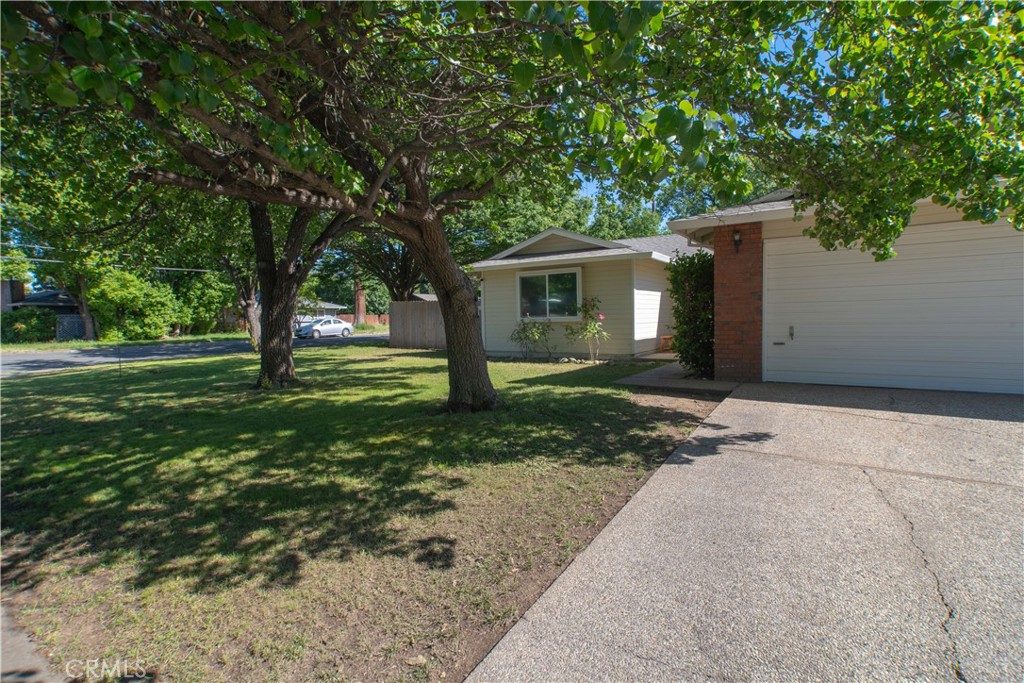 1 San Ramon Drive Chico, CA 95973 - Photo 38 of 42 a view of a house with a yard