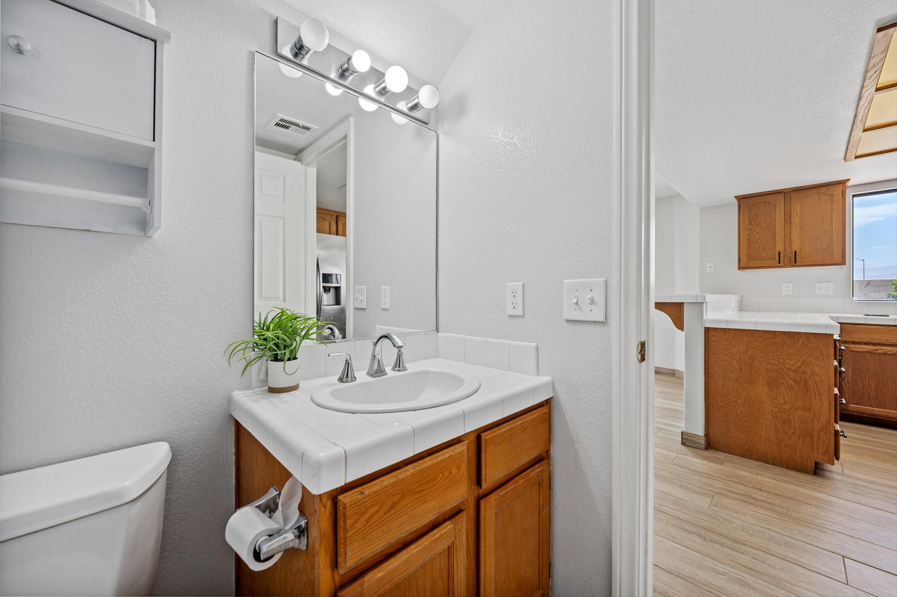81064 Jessica Way Indio, CA 92201 - Photo 24 of 34 a bathroom with a sink and a mirror