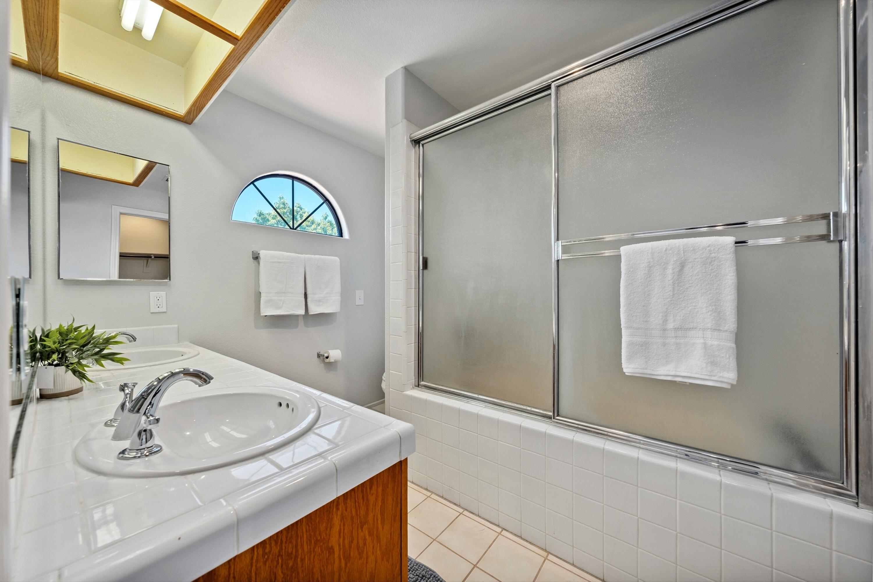81064 Jessica Way Indio, CA 92201 - Photo 29 of 34 a bathroom with a sink and a mirror