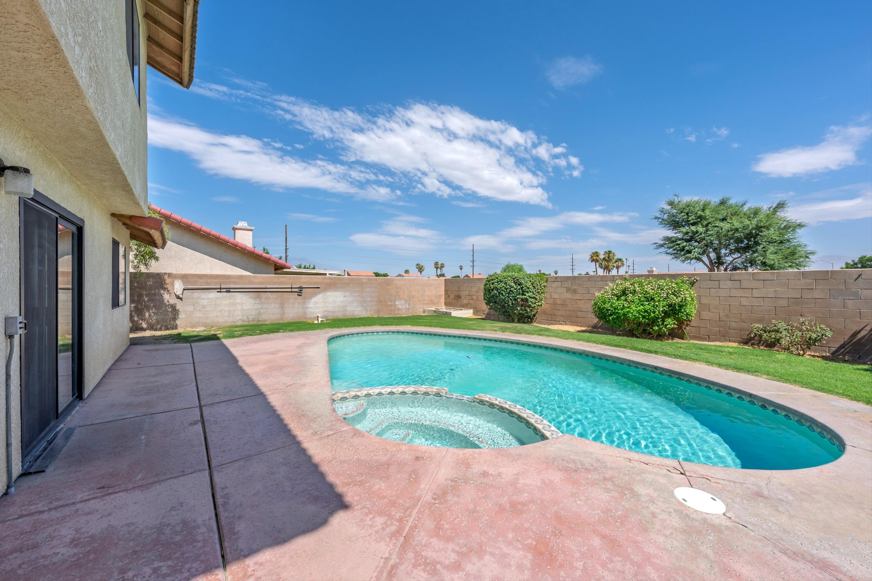 81064 Jessica Way Indio, CA 92201 - Photo 3 of 34 a view of a backyard