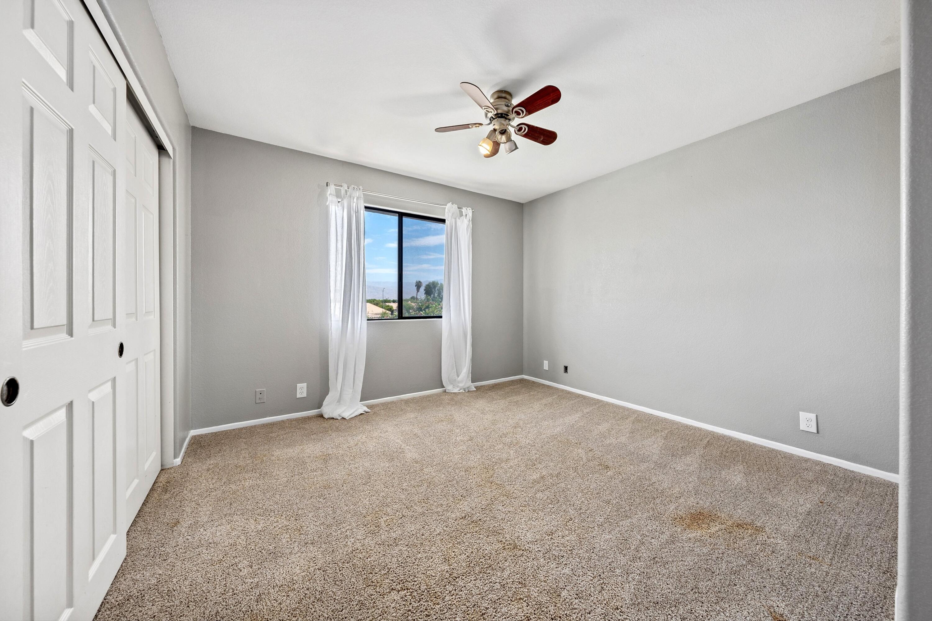 81064 Jessica Way Indio, CA 92201 - Photo 31 of 34 a view of an empty room and window