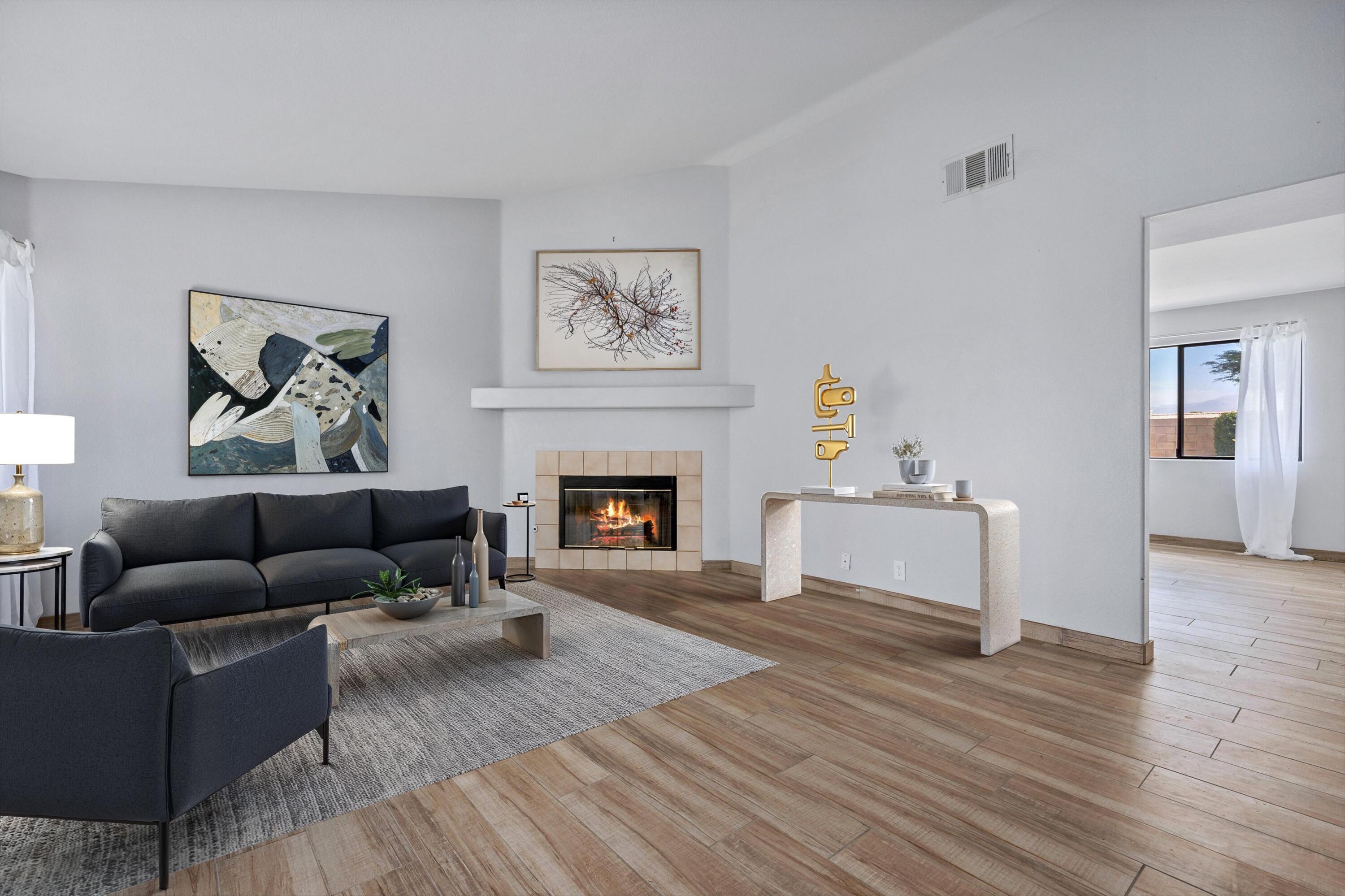 81064 Jessica Way Indio, CA 92201 - Photo 7 of 34 a living room with furniture and a fireplace