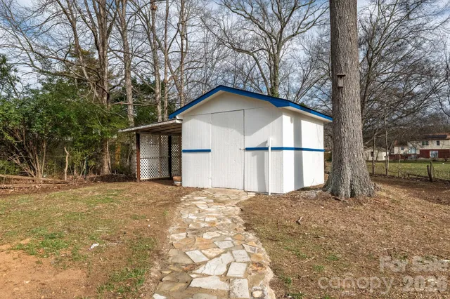 a house with trees in front of it