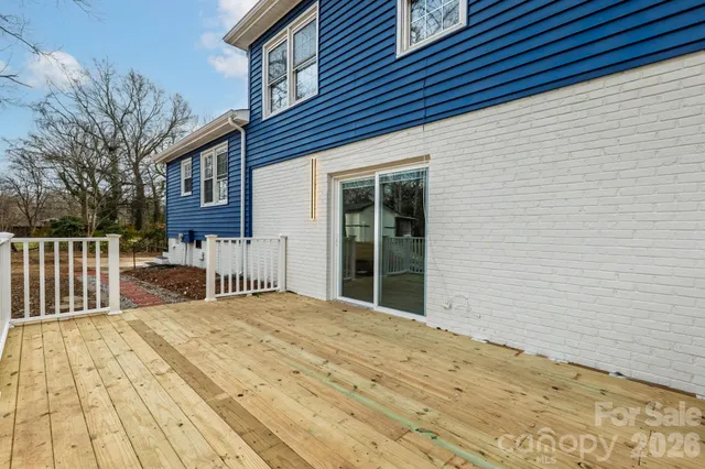 a view of a house with a barbeque