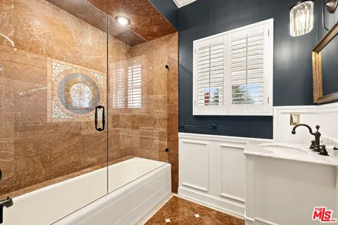 a view of a chairs and table in the garden