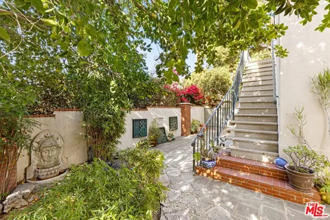 a view of street with parked cars