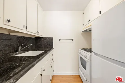 a view of street with flower plants