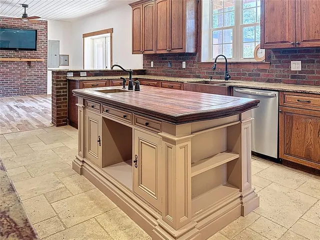 a bathroom with a shower and toilet