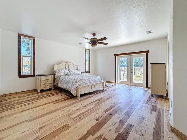 a bathroom with a shower and toilet