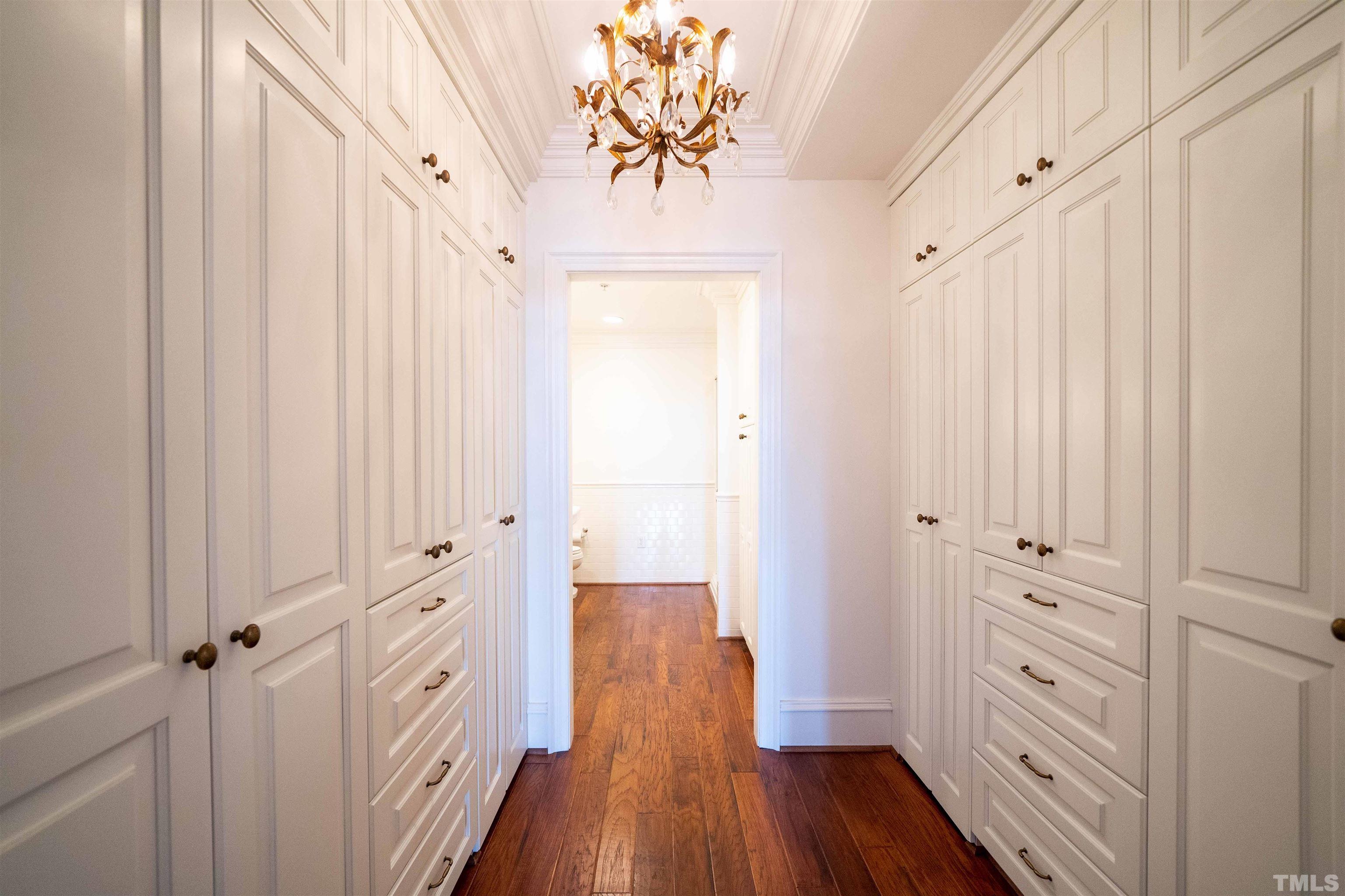 710 Independence Place, Unit 407 Raleigh, NC 27603 - Photo 6 of 10 a view of a hallway with wooden floor