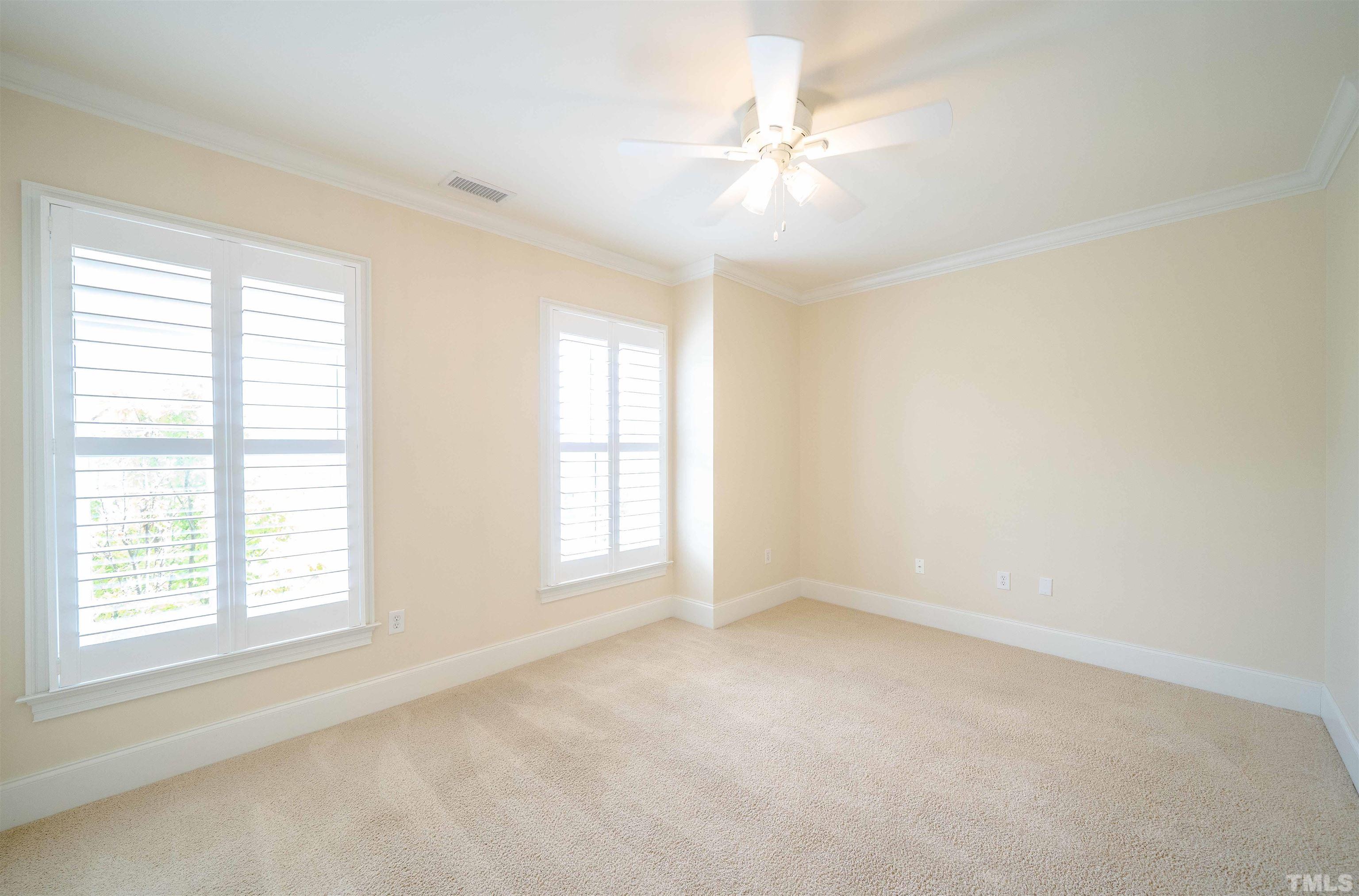 710 Independence Place, Unit 407 Raleigh, NC 27603 - Photo 8 of 10 a view of an empty room with a window