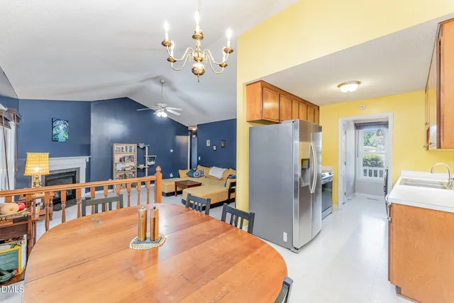 a kitchen with a sink cabinets and a window