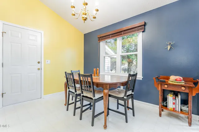 a view of a living room and kitchen