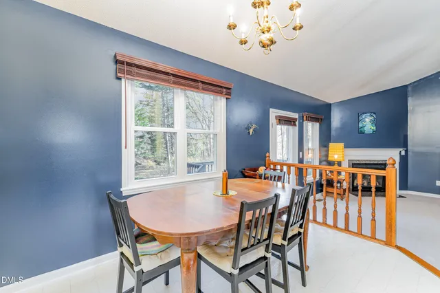 a kitchen with a sink and a wooden cabinets