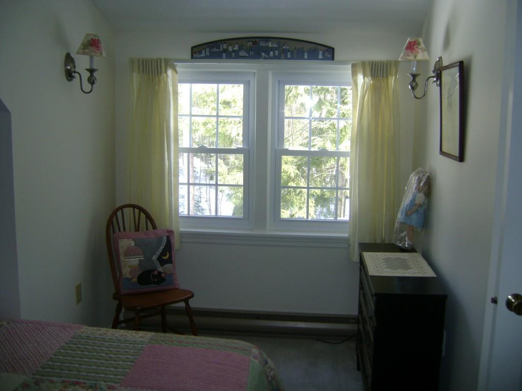 137 Flintlock Village Road, Unit 1 Wells, ME 04090 - Photo 27 of 30 Double window looking out back. All...