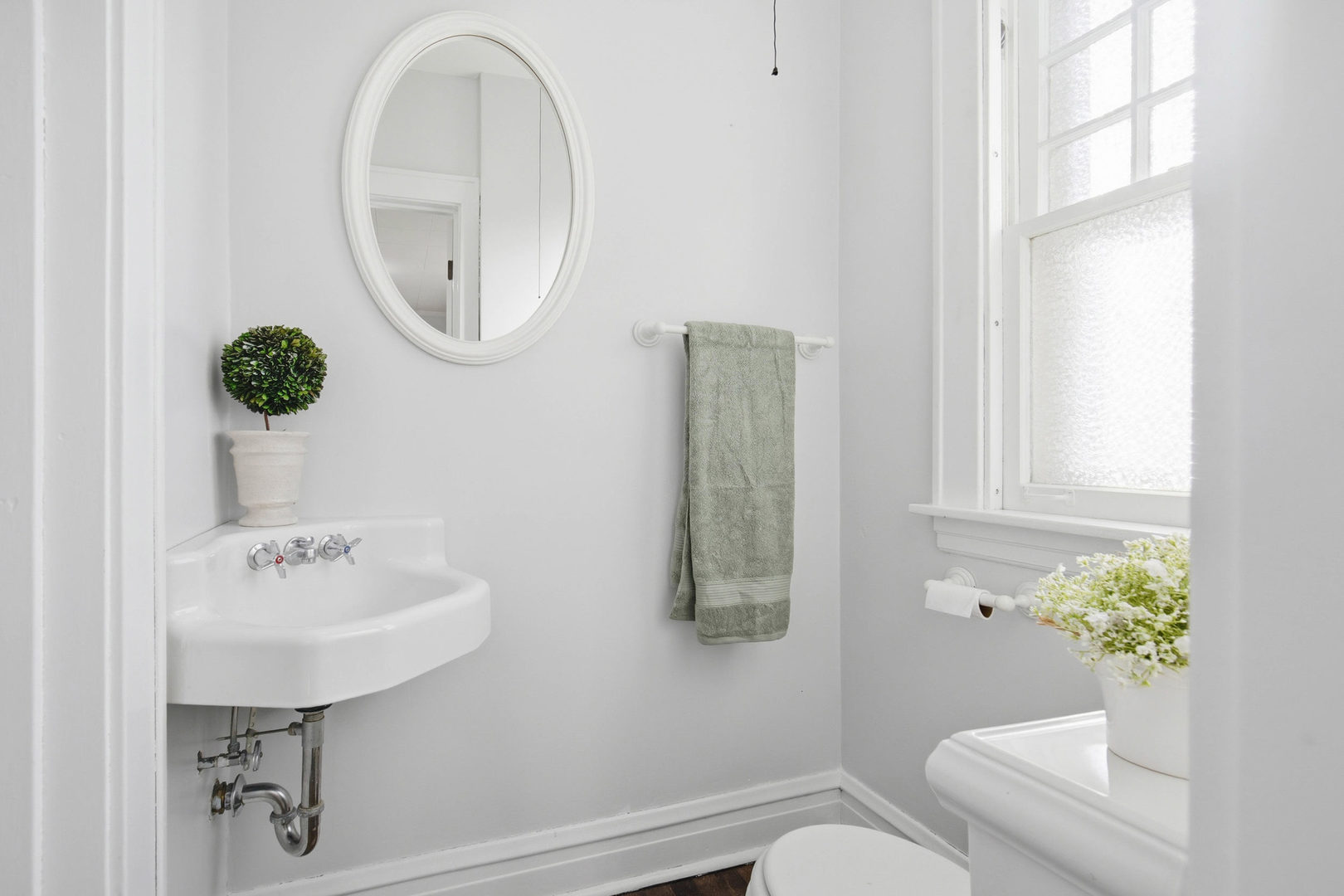 1489 East Algonquin Road Des Plaines, IL 60016 - Photo 11 of 34 a bathroom with a sink toilet and a mirror