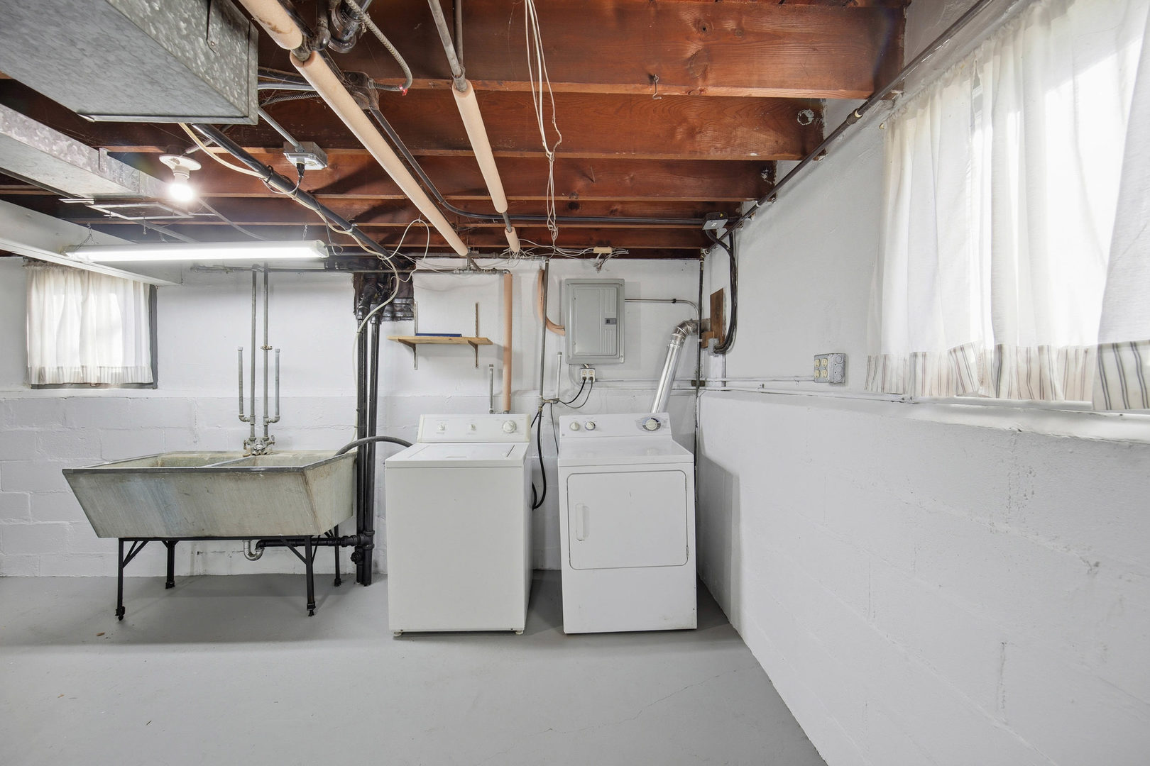1489 East Algonquin Road Des Plaines, IL 60016 - Photo 21 of 34 a utility room with dryer and washer