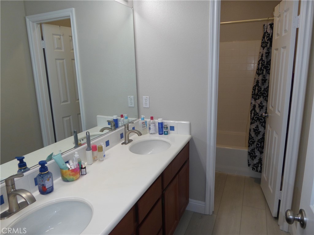 17115 Noble View Circle Riverside, CA 92503 - Photo 36 of 50 Third Upstairs Bathroom with Tub & Shower off Hallway.
